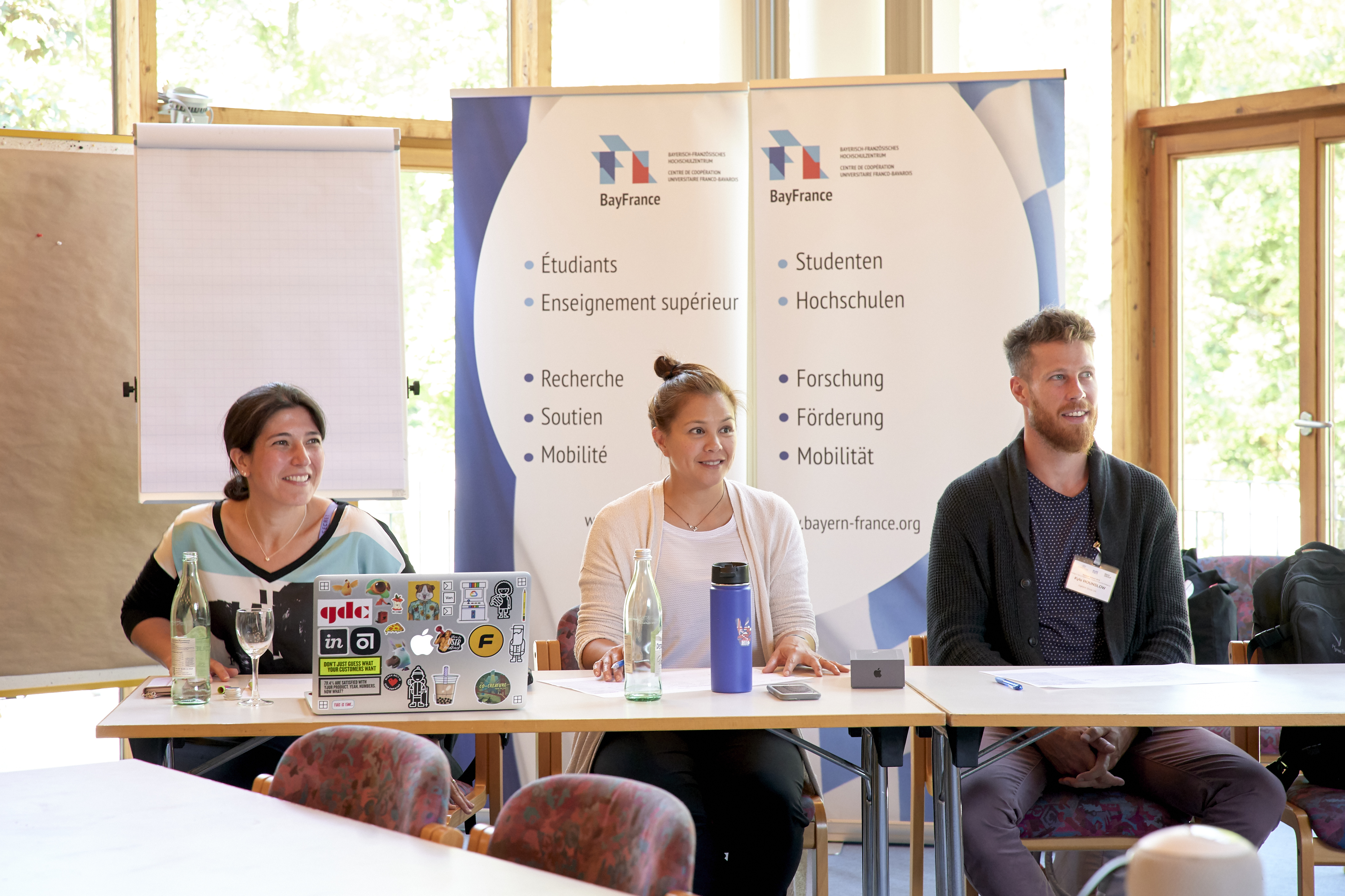 Facilitation team presenting The Lean Startup Machine at the BMW Summer School, Bavaria