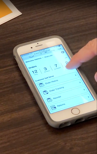 Participant testing the Finning app on a mobile device